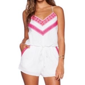 White romper with pink detail